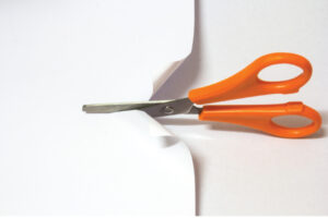 Orange Scissors Cutting Paper