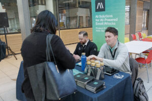 Vendor Talking to Attendee at EdgeCon Winter 2026